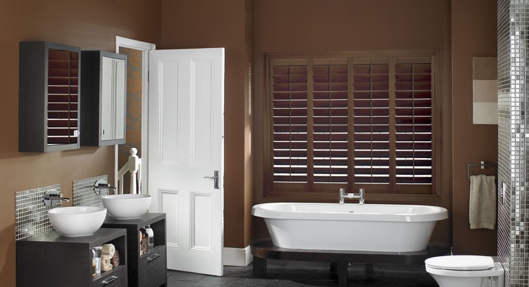 Stained wood shutter in Las Vegas restroom